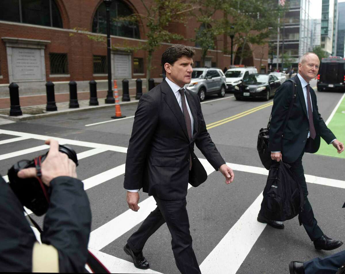 Greenwich attorney Gordon Caplan exits after his sentencing at the John Joseph Moakley United States Courthouse in Boston on Thursday, Oct. 3, 2019. Caplan was sentenced to one month in prison for paying $75,000 to improve his daughter's scores on a college admissions test. He was busted as part of the Varsity Blues federal sting operation that ensnared 50 people in crimes involving bribery and manipulating college entrance exam scores.