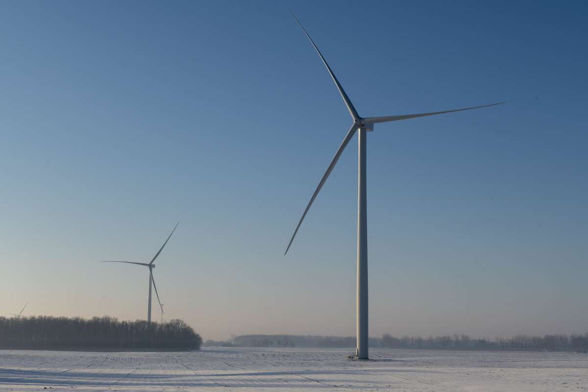 Turbines stand in a field at DTE's Pine River Wind Park in Gratiot and Isabella counties.