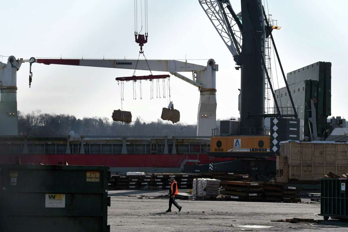 Cargo is unloaded from a vessel at the Port of Albany on Wednesday March 3, 2021, in Albany N.Y. The port is planning a major offshore wind assembly operation to supply offshore wind farms being built off Long Island. (Will Waldron/Times Union)