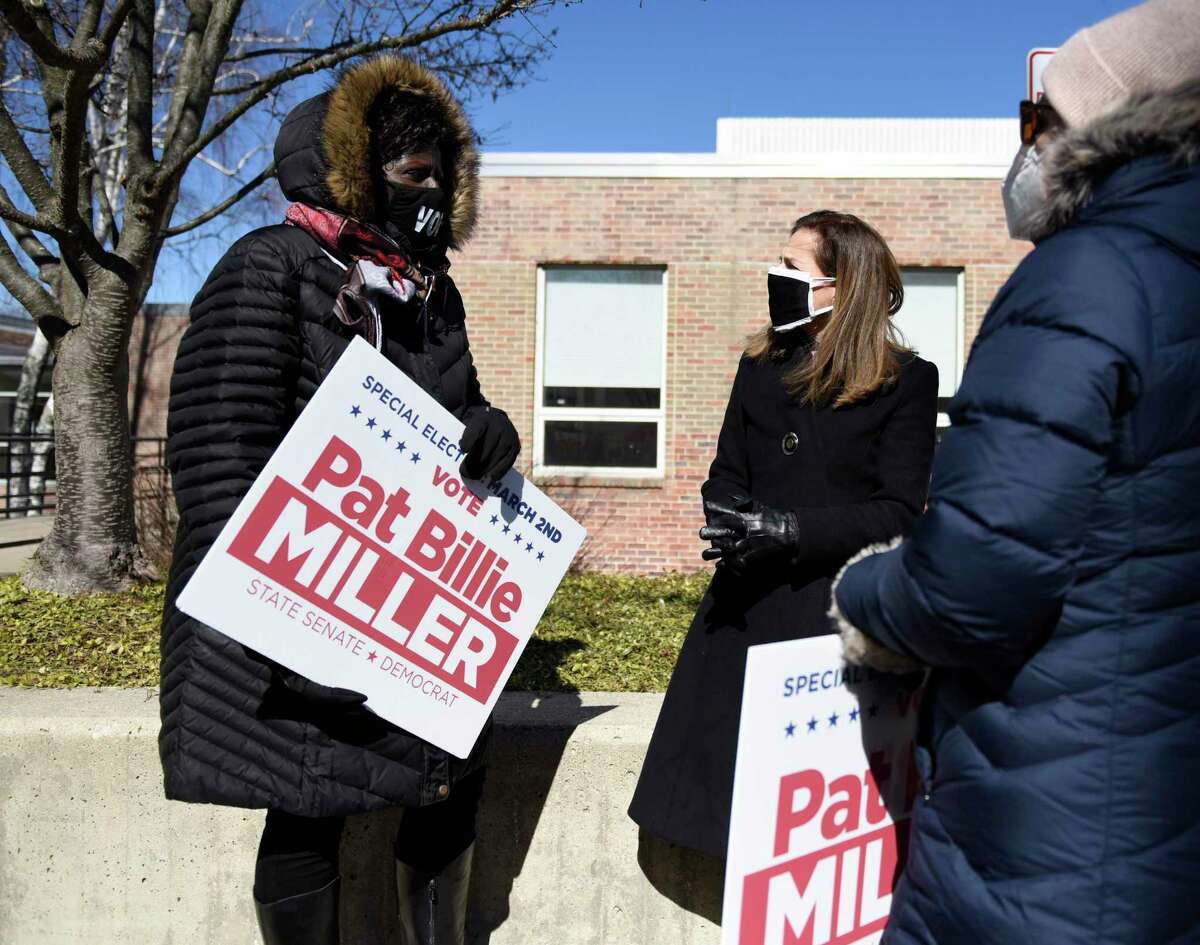 Democratic candidate for state senator Patricia Billie Miller, left, campaigns with Connecticut Lt. Gov. Susan Bysiewicz at the Darien RTM District 2 and District 5 polling center at Town Hall in Darien, Conn. Tuesday, March 2, 2021. State Rep. Patricia Billie Miller, a Democrat, and Joshua Esses, a Republican, face off Tuesday in the special general election for Connecticut State Senate District 27 after former State Sen. Carlo Leone resigned to serve in Gov. Ned Lamont's administration.