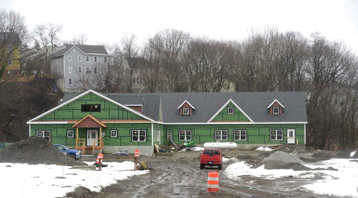 Construction continues on a 20-bed home for women and children in crisis at a formerly contaminated site on Rose Hill Avenue, in Danbury, Conn., Monday March 1, 2021.