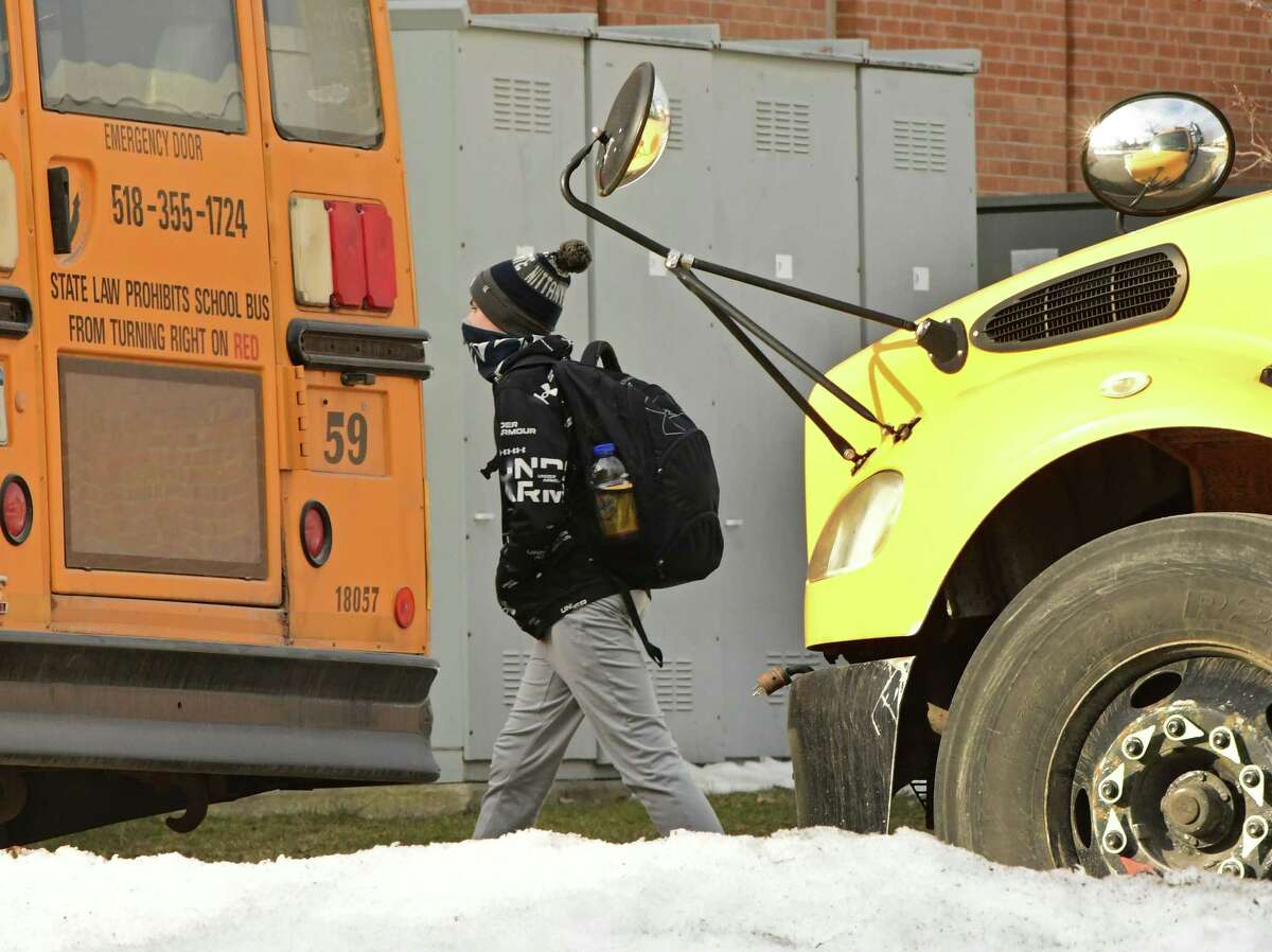 Students are seen leaving Schenectady High School as the school dismisses for the day on Wednesday, March 3, 2021 in Schenectady, N.Y. A report from the Empire Center for Public Policy in March 2021 said public school enrollment is continuing to decline. (Lori Van Buren/Times Union)