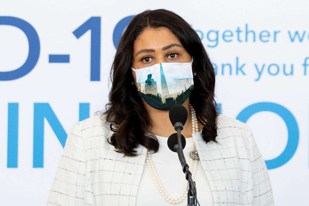 In this file photo, San Francisco Mayor London Breed speaks alongside healthcare leaders to announce the opening of a mass COVID-19 vaccination site at Moscone South in San Francisco, Calif. Thursday, February 4, 2021. Breed said Tuesday that the city could enter the state’s less restrictive orange reopening tier as soon as March 24.