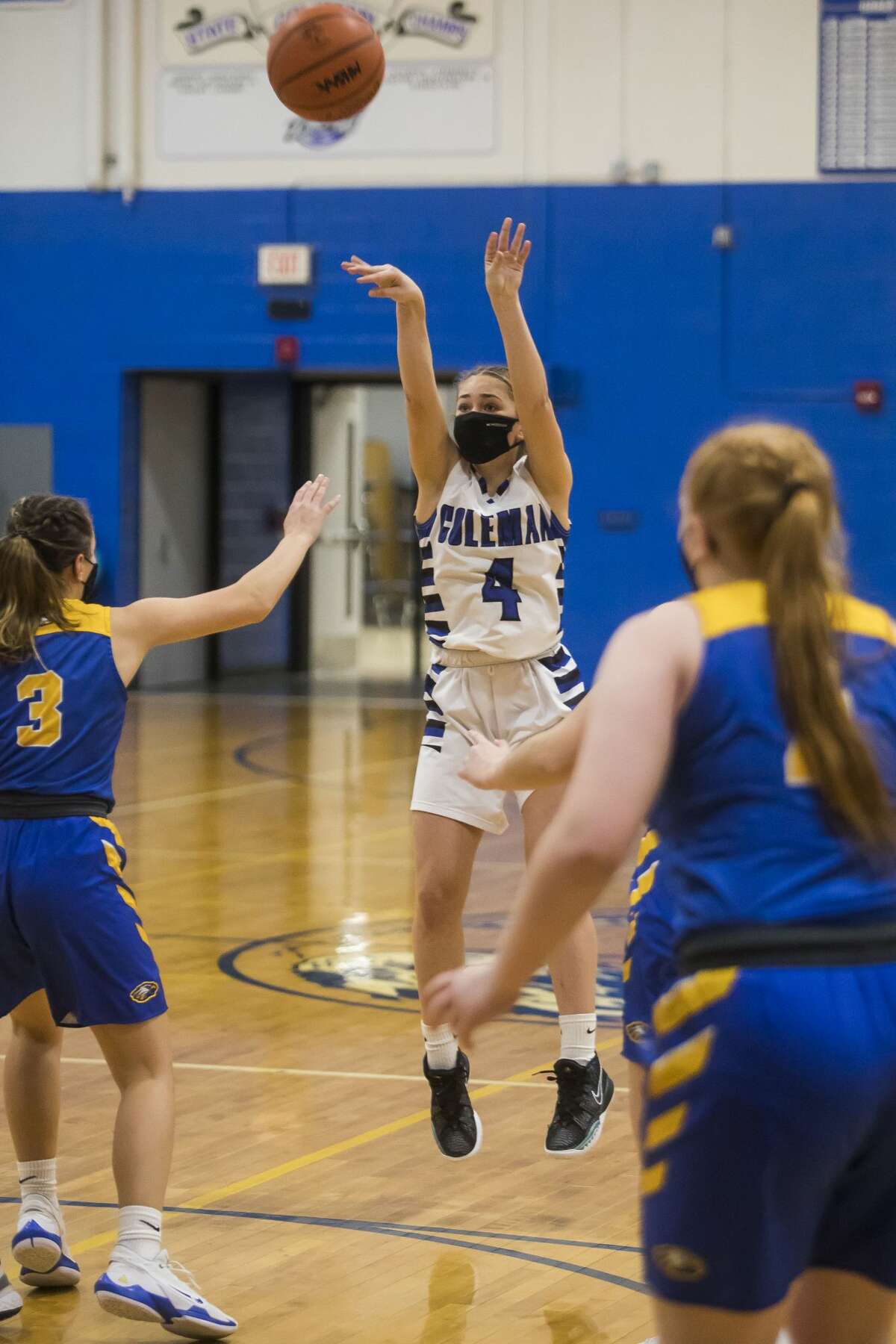 Coleman's Maddy Miller takes a 3-pointer during a Feb. 25, 2021 game against Carson City-Crystal.