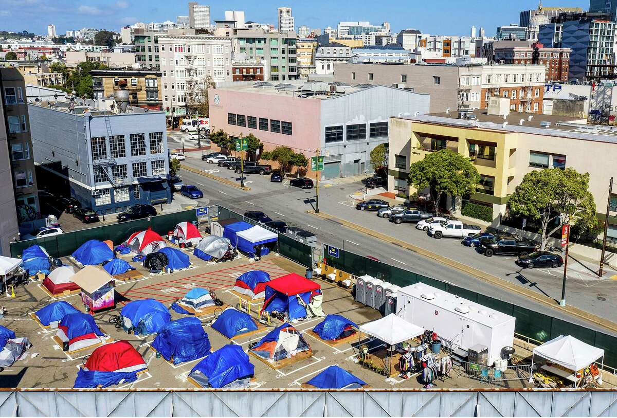 Tents line a city-sanctioned homeless encampment on Gough St. on Thursday, March 4, 2021, in San Francisco.