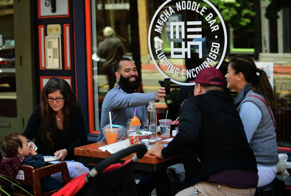 Local patrons dine at Mecha Noodle Bar on Washington Street in Norwalk in May 2020.