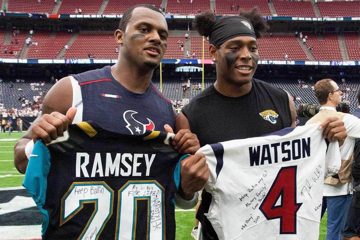 Deshaun Watson #4 of the Houston Texans and Jalen Ramsey #20 of the Jacksonville Jaguars exchange jerseys after the game at NRG Stadium on September 10, 2017 in Houston, Texas. (Photo by Bob Levey/Getty Images)