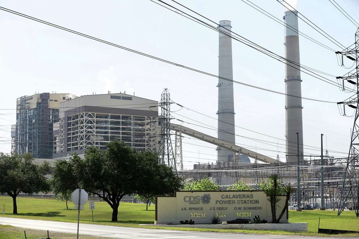CPS Energy’s J.K. Spruce plant, left, is the utility company’s last remaining coal-fired plant.