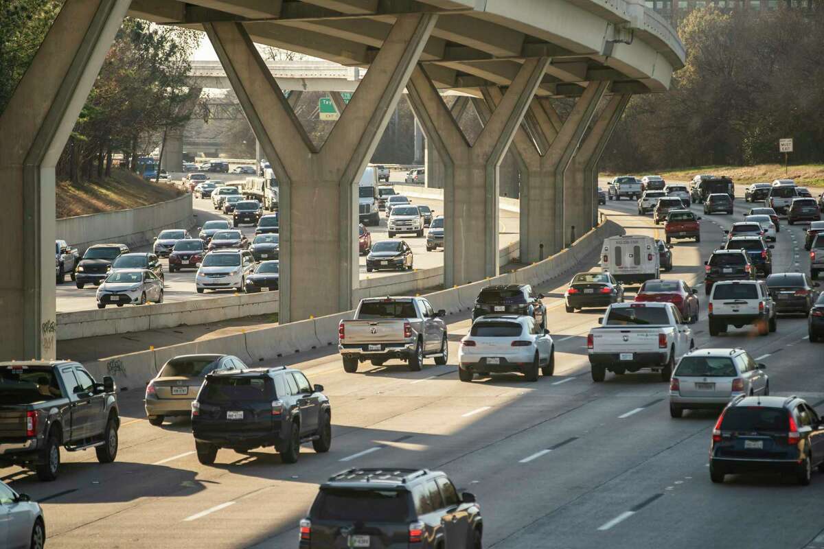 Traffic travels near downtown Houston at Houston Avenue on Interstate 10 on Wednesday, March 3, 2021.