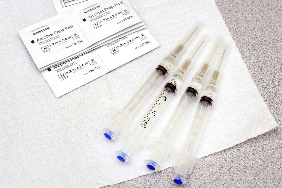 A vial of the new Johnson & Johnson COVID-19 vaccine at the vaccination clinic held for teachers and school staff in Trumbull, Conn. March 4, 2021.