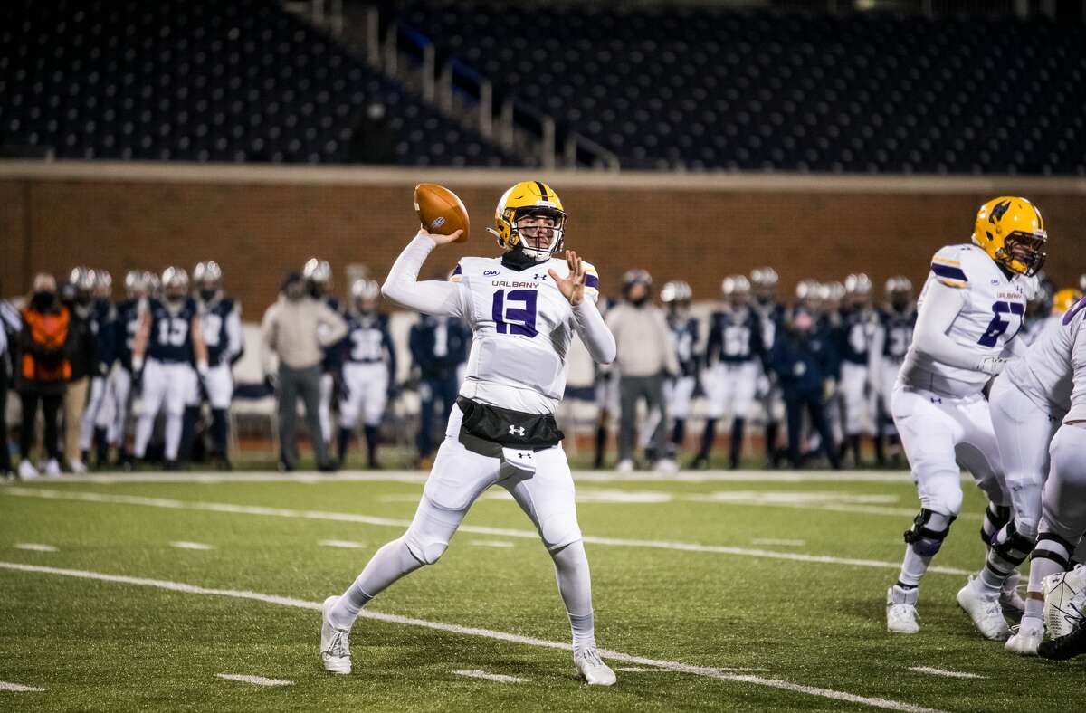 Redshirt sophomore quarterback Jeff Undercuffler attempt a pass against New Hampshire in a Colonial Athletic Association football game Friday, March 6, 2021, in Durham, N.H. (China Wong/UNH athletics)