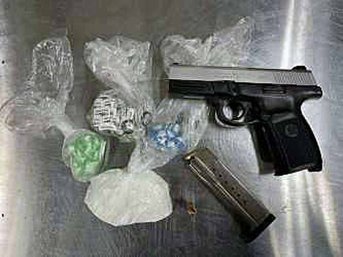 Items seized during an arrest in Meriden, Conn., on Friday, March 5, 2021.