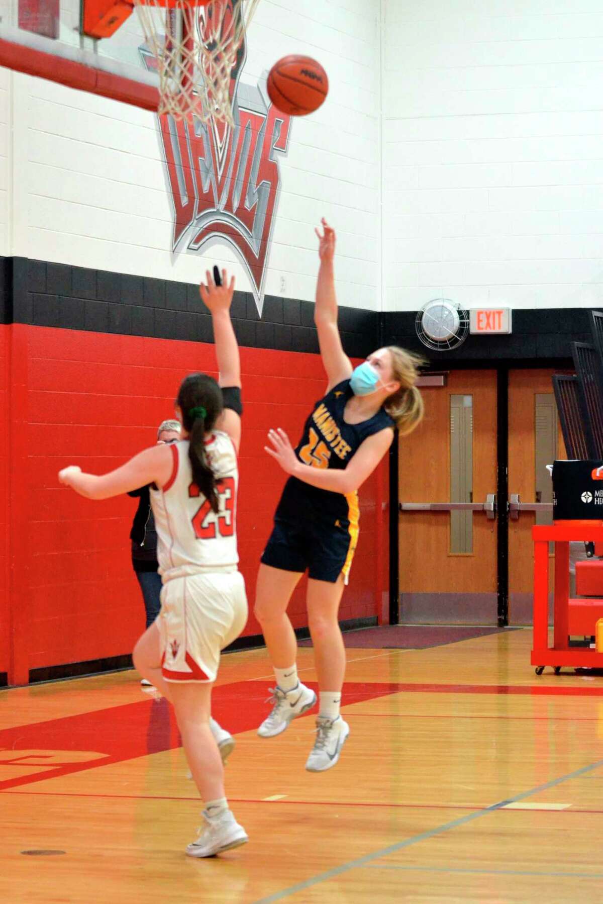 Manistee's Lacey Zimmerman scores a fast break bucket Friday night in the Chippewas' victory over Holton. (Photo courtesy of Tina Robinson)