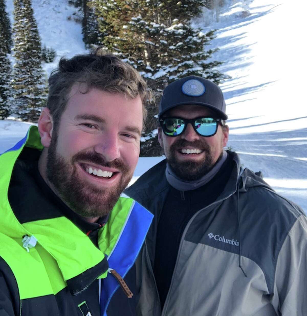former 'Bachelorette' contestant James McCoy Taylor, left, skiing in Utah on Jan. 7.