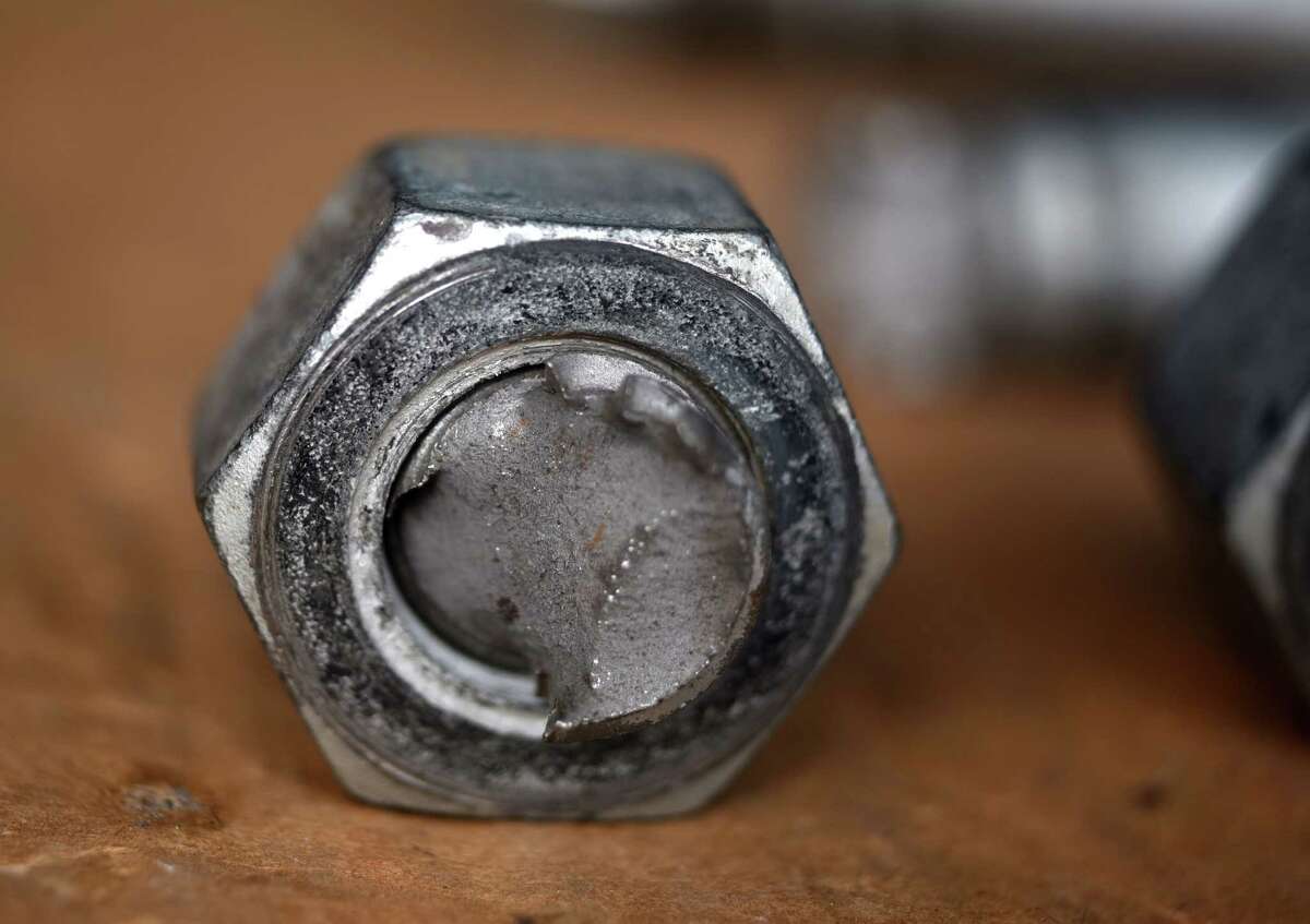 A broken defective bolt used in construction of the Gov Mario M. Cuomo Bridge which snapped during its assembly at the Port of Coeymans is displayed on Saturday, March 6, 2021, in Colonie, N.Y. Some of the high strength bolts would snap under the first stage of torquing. Many were delivered to the job site with cracks already visible in the heads. (Will Waldron/Times Union)