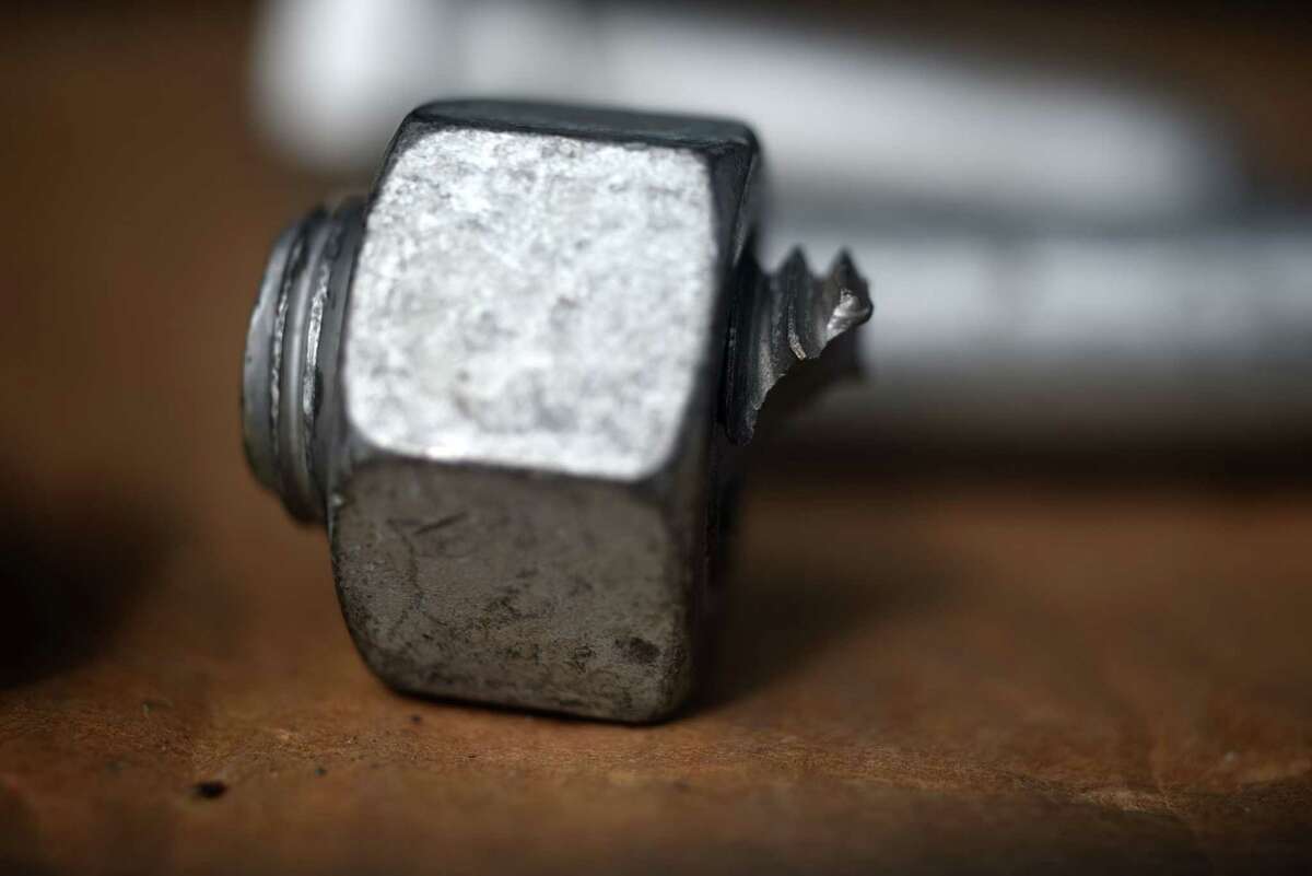 A broken defective bolt used in construction of the Gov Mario M. Cuomo Bridge which snapped during its assembly at the Port of Coeymans is displayed on Saturday, March 6, 2021, in Colonie, N.Y. Some of the high strength bolts would snap under the first stage of torquing. Many were delivered to the job site with cracks already visible in the heads. (Will Waldron/Times Union)