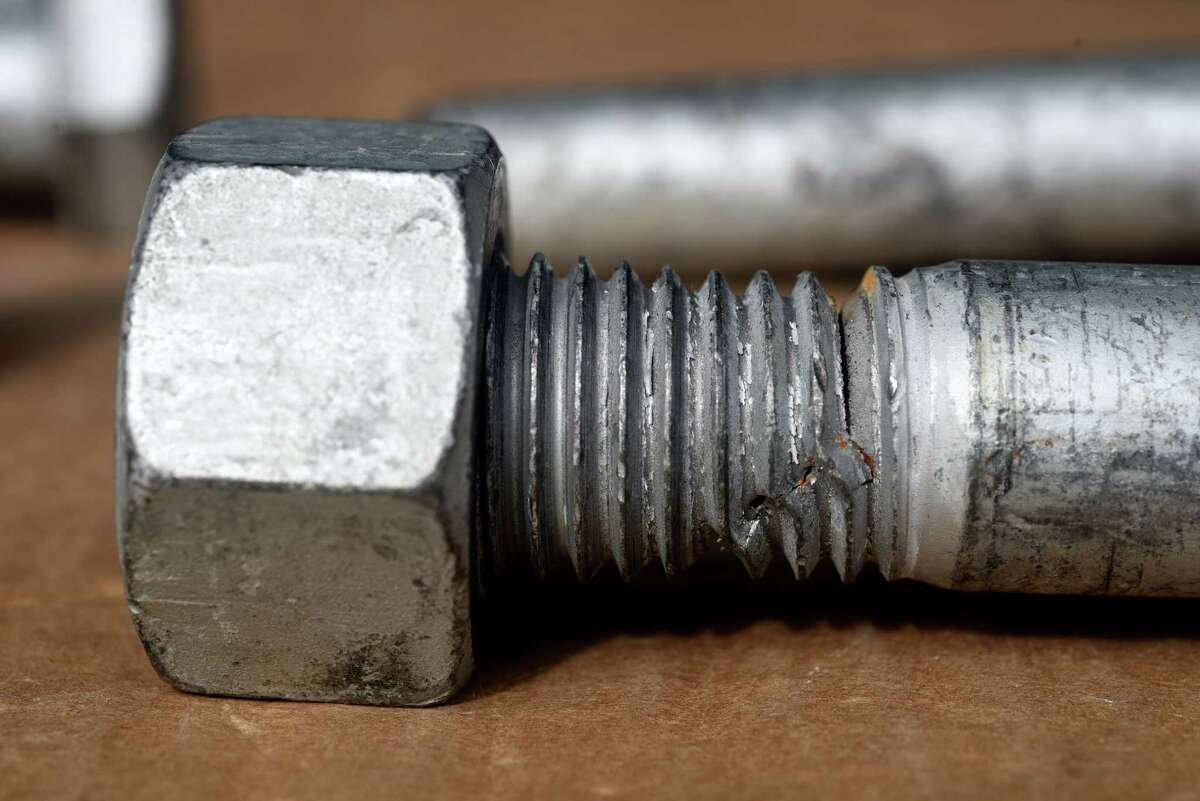 Broken defective bolt used in construction of the Gov Mario M. Cuomo Bridge which cracked during its assembly at the Port of Coeymans is pictured on Saturday, March 6, 2021, in Colonie, N.Y. Some of the high strength bolts would snap under the first stage of torquing. Many were delivered to the job site with cracks already visible in the heads. (Will Waldron/Times Union)