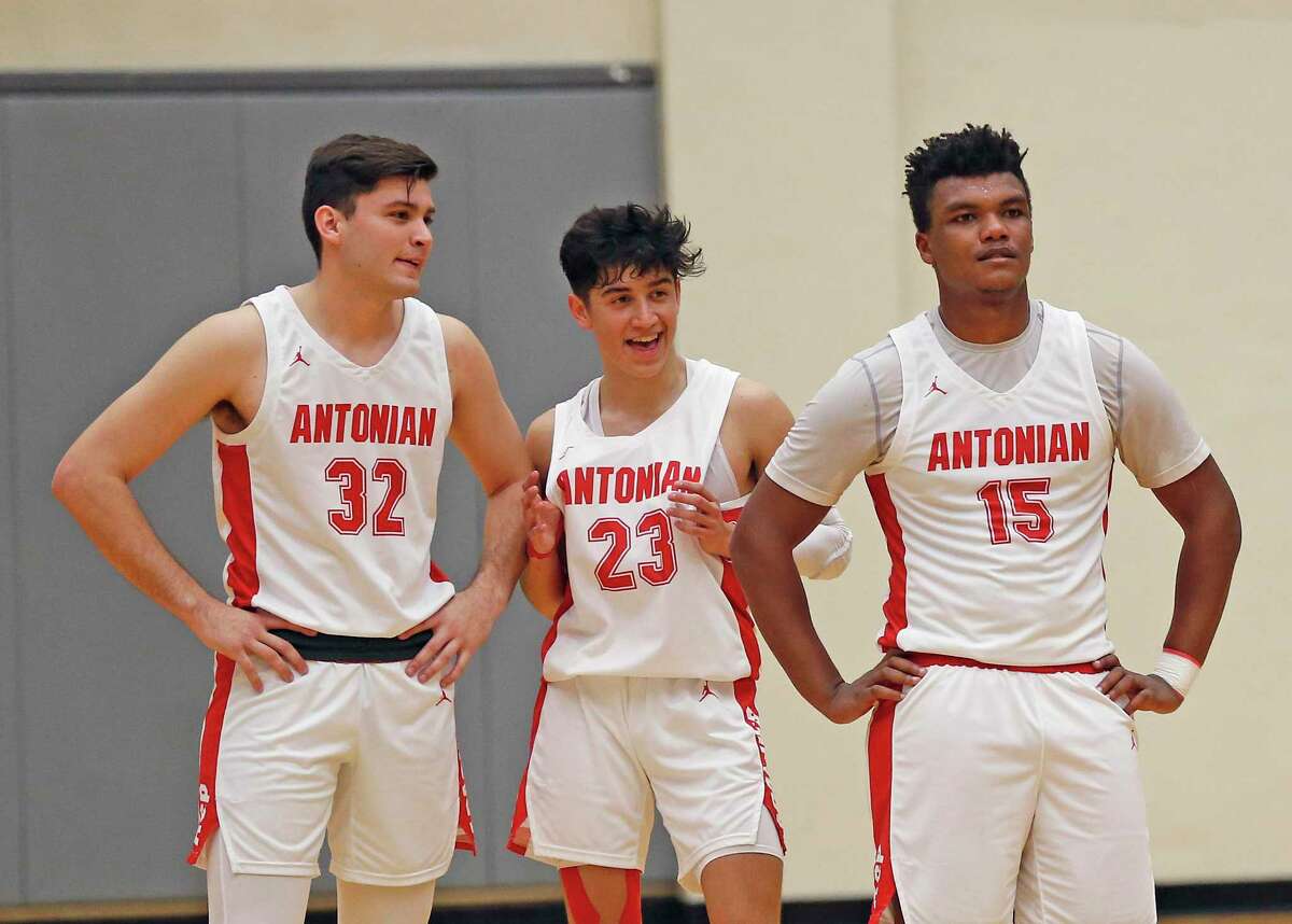Antonian Freddy Amaro #32,Antonian Xavier Martinez #23 and Antonian Bryon Armstrong #15 watch the seconds kickoff in the second half. Antonian vs. Central Cathlolic in TAPPS Class 6A state quarterfinal on Saturday, March 6, 2021 at Lilleton Gym.