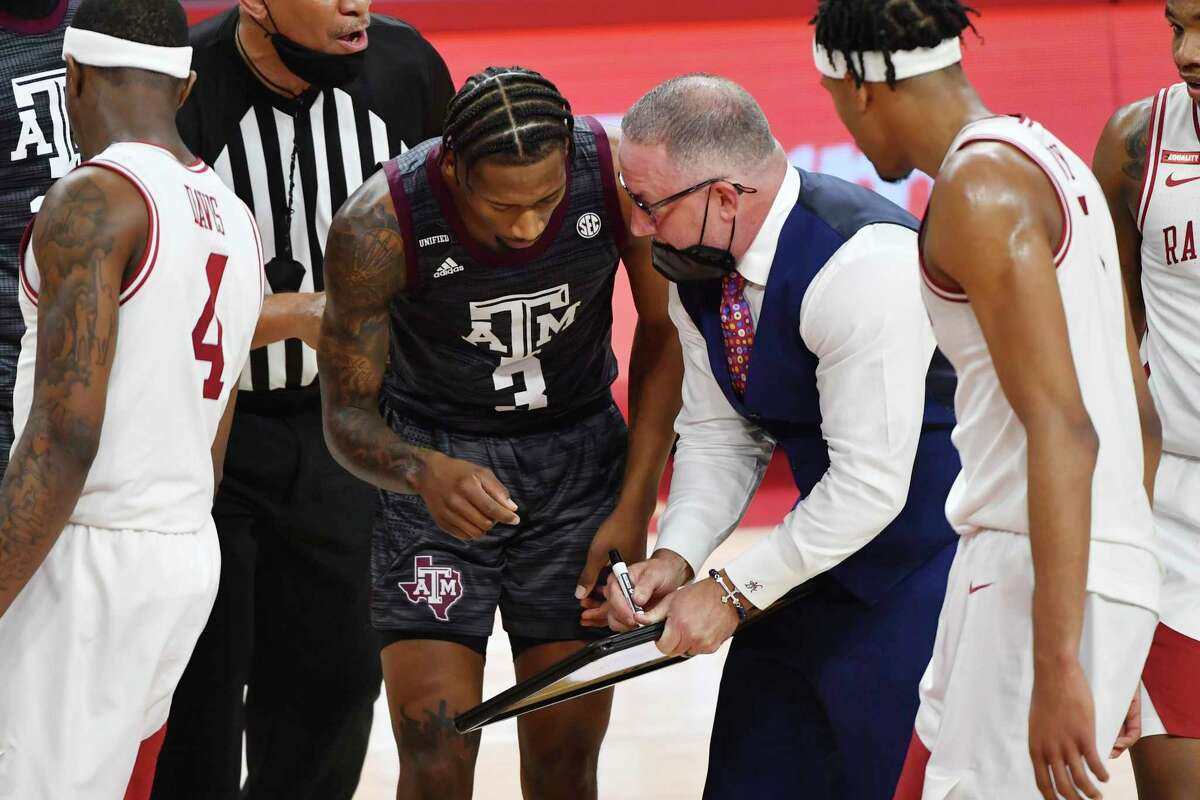 Texas A&M University basketball coach fights back after facing