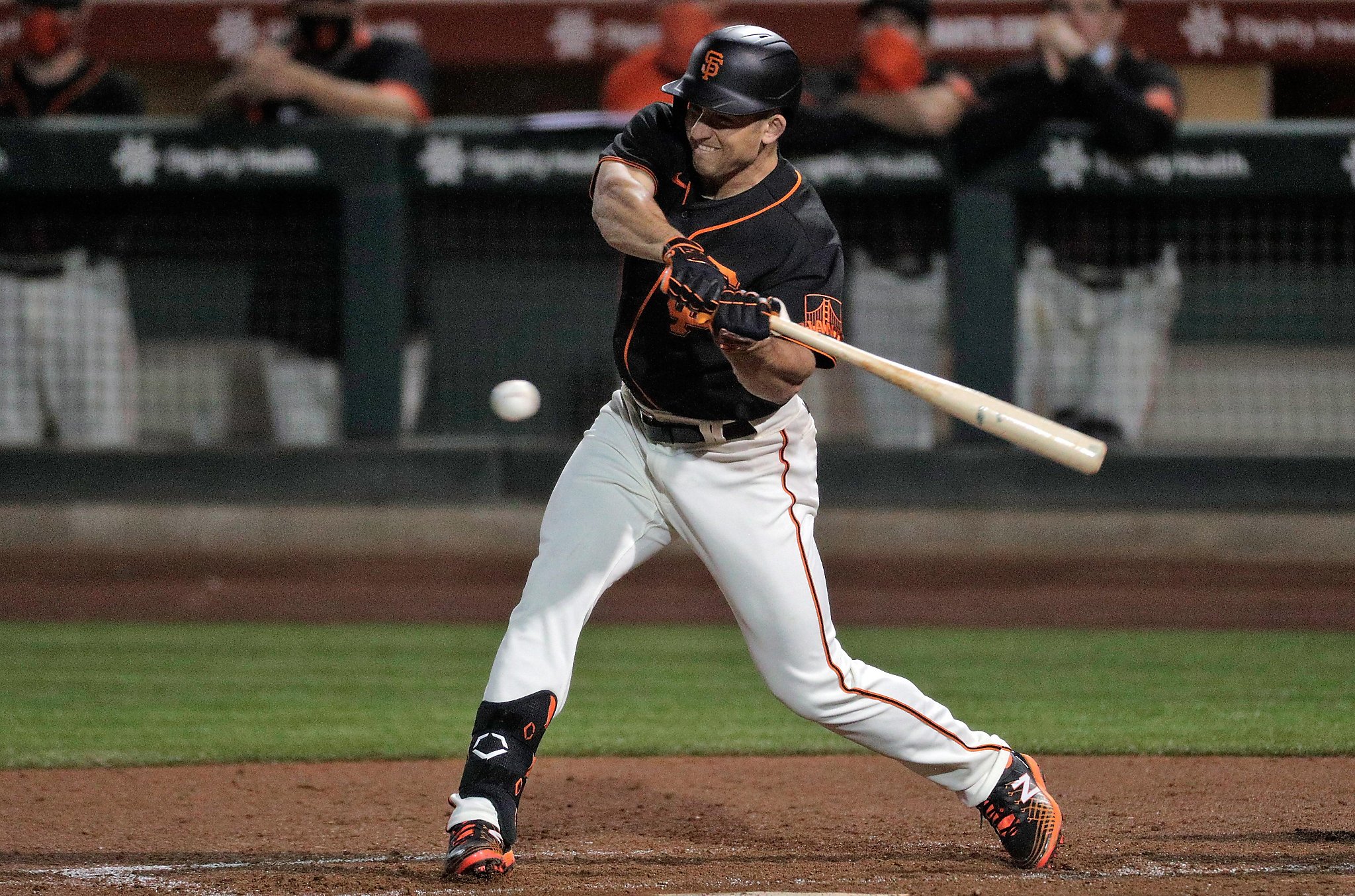 Different buzz' around Buster Posey at Giants camp this year