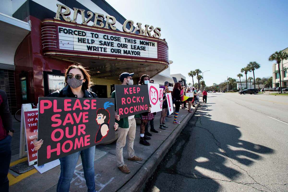 Fans and patrons of the Landmark River Oaks Theatre demonstrate against the potential closure of the historic movie theater Sunday, March 7, 2021 in Houston. The iconic Houston landmark faces a real threat with its lease ending at the end of March, and Weingarten and Landmark Theatres have failed to come to an agreement about its fate.