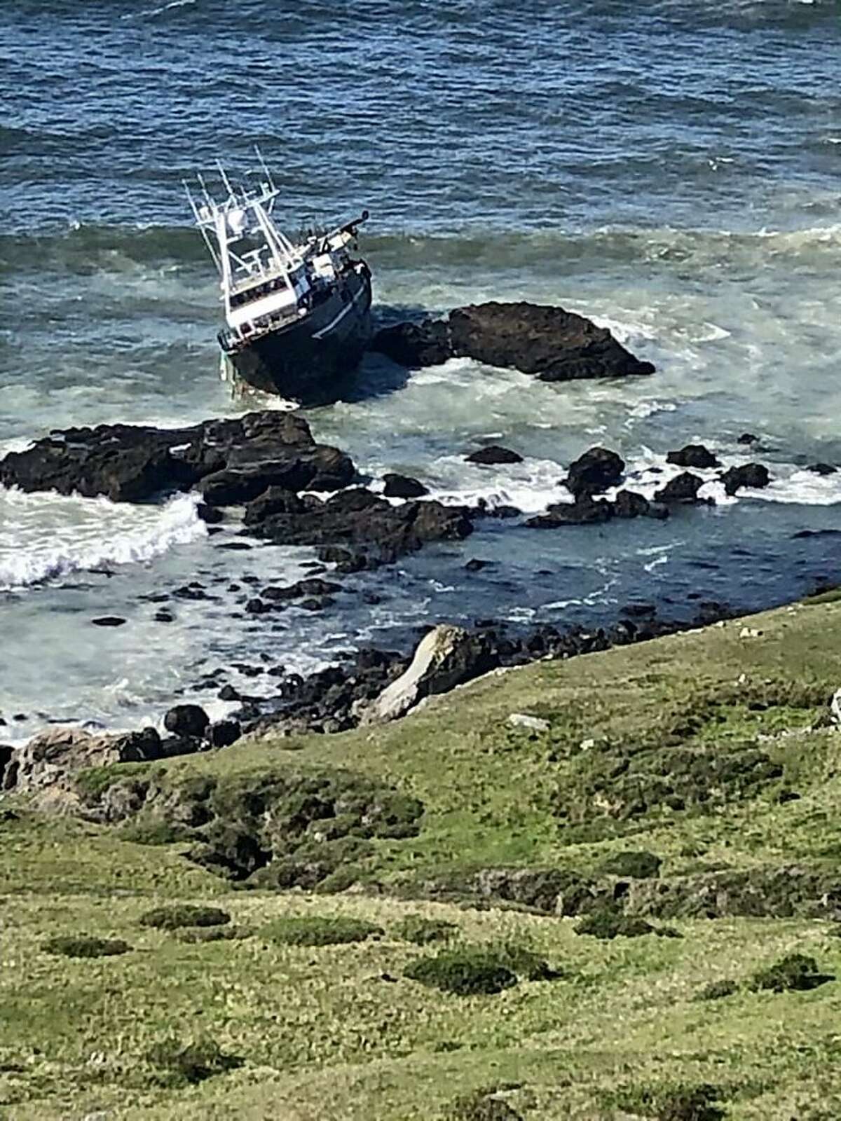 The Coast Guard was investigating a possible fuel spill off the coast of West Marin Sunday after a boat ran aground earlier in the weekend.