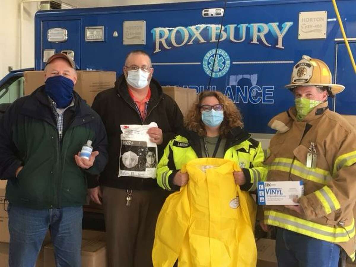 Ocean State Job Lot Charitable Foundation Executive Director David Sarlitt, Ocean State Job Lot store team leader Rich Stomski, Roxbury Ambulance Association Chief Sarah Lauriat and Roxbury Volunteer Fire Chief Todd Wheeler.