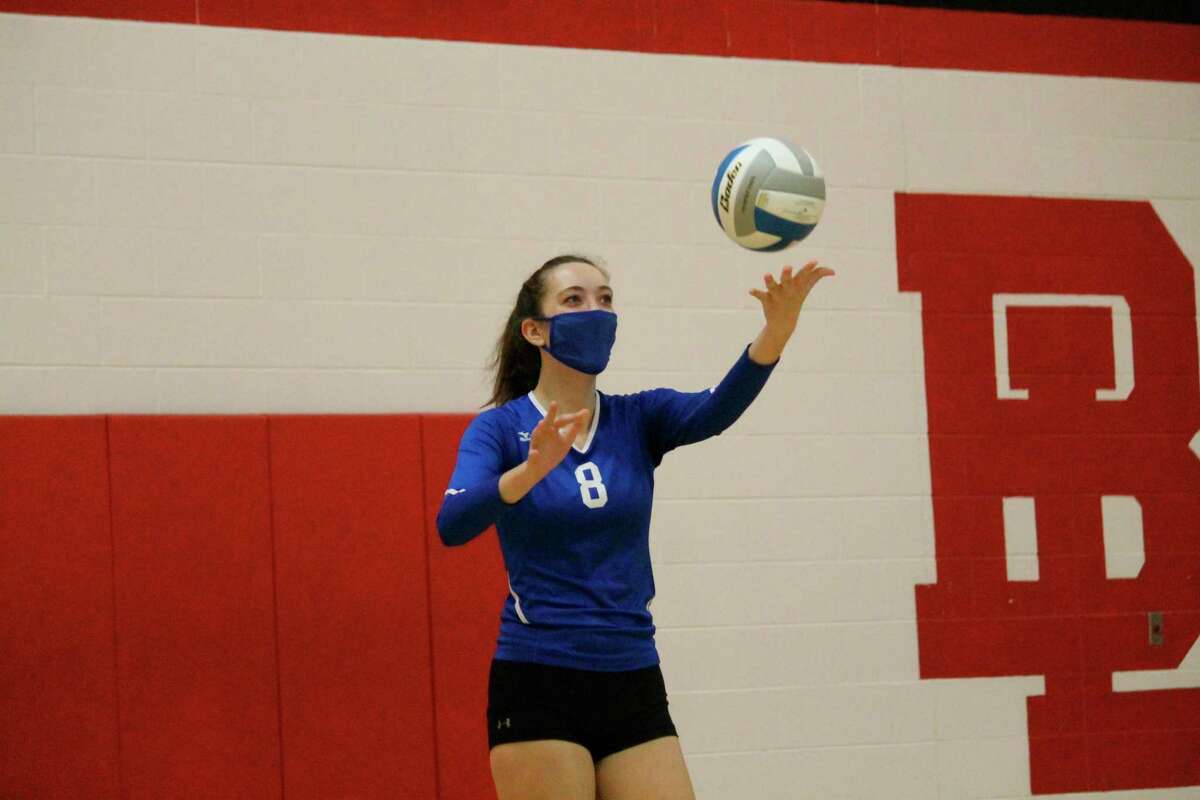 Though most known for her dominant play at the net, Onekama's Kristin Bonecutter proved she could excel anywhere on the volleyball court. (News Advocate file photo)