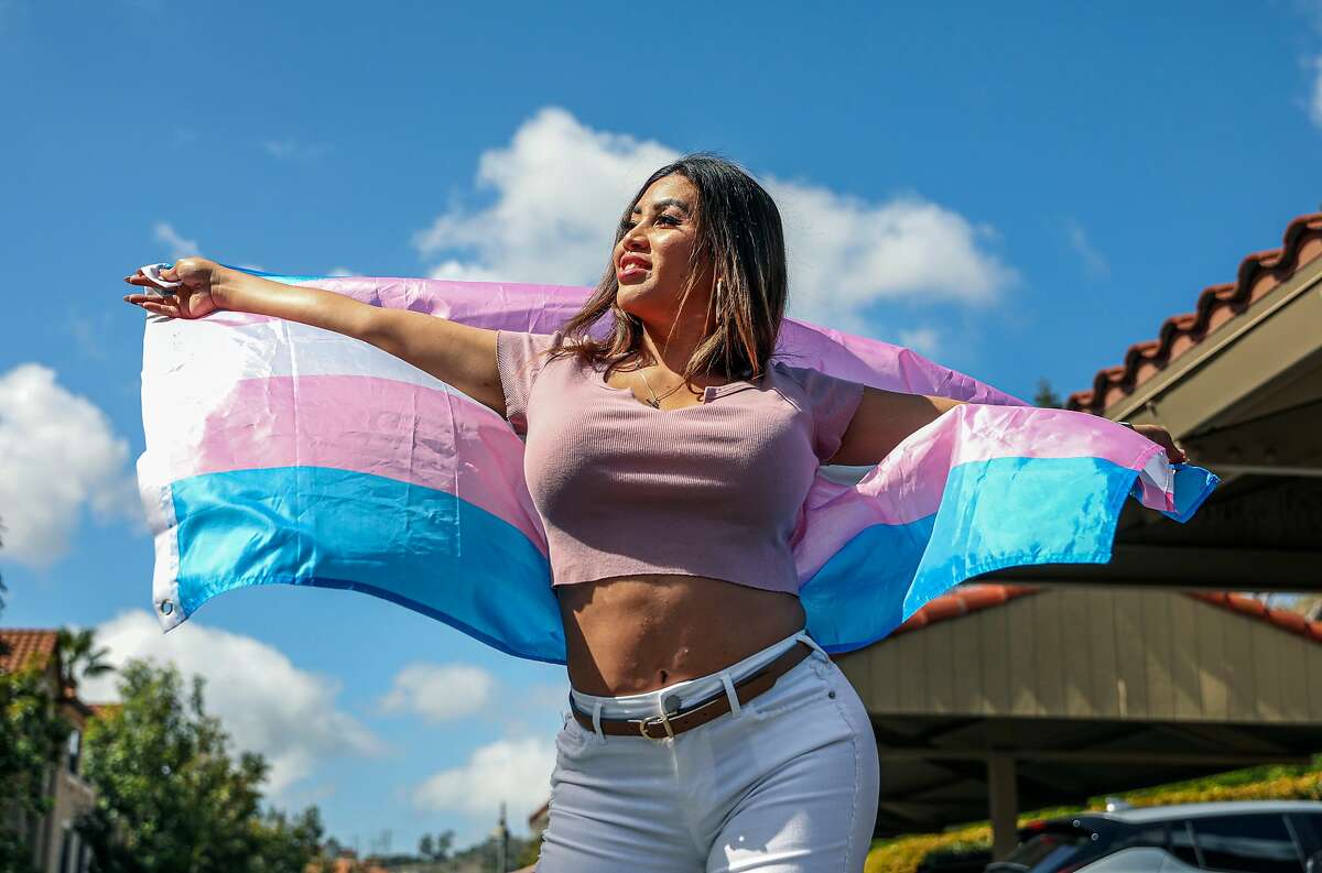San Diego sex worker TS Jane lets her trans flag fly outside of her home.