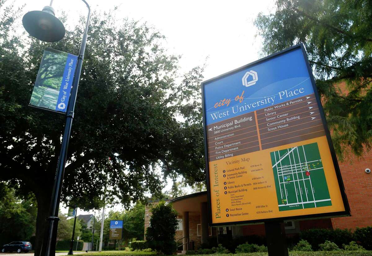 A sign in front of the municipal building at the intersection of University Boulevard and Auden Street shows the central area of West University Place, a city within the city of Houston, Tuesday, Sept. 29, 2015. ( Mark Mulligan / Houston Chronicle )