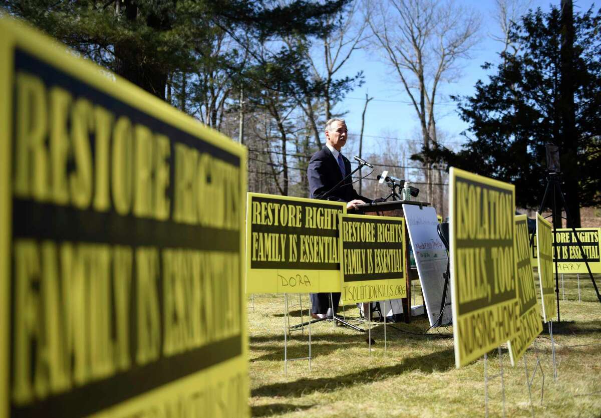 First Selectman Fred Camillo speaks at the one year nursing home "banniversary" protest in Greenwich, Conn. Monday, March 8, 2021. The event was put together by people with family members at Nathaniel Witherell who want more visits with loved ones and for the policies to be loosened.