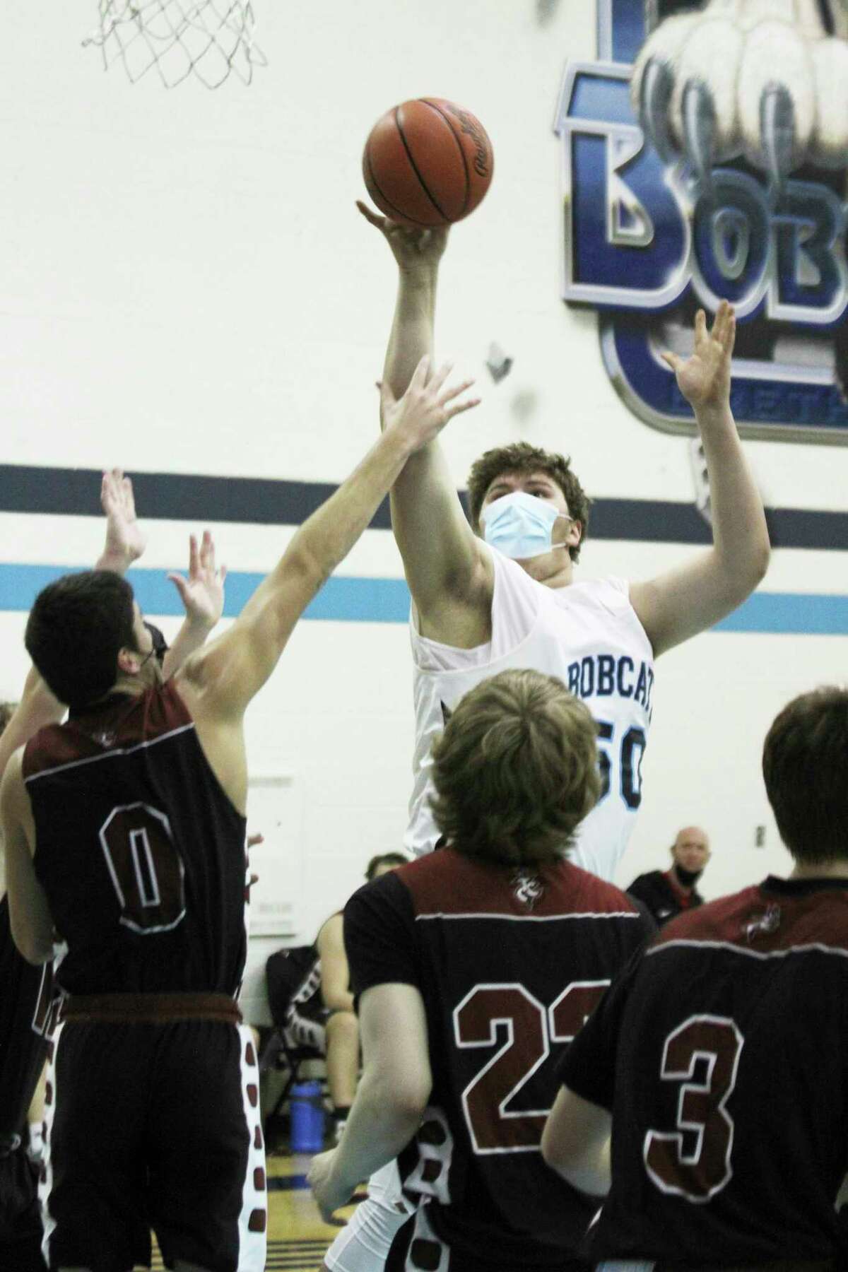 Brethren's Anthony Beccaria eyes the hoop during Monday's win over Traverse City Christian. (Dylan Savela/News Advocate)