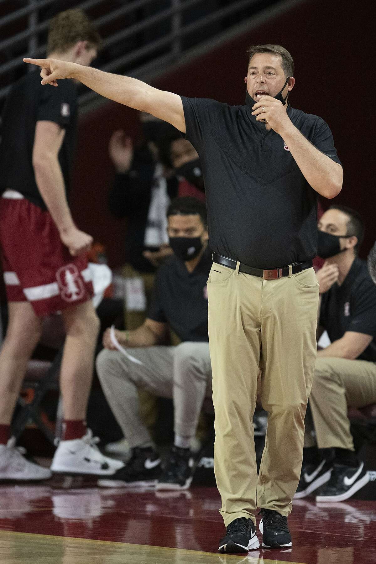 Stanford coach Jerod Haase gives instructions to players during the first half of the team's NCAA college basketball game against Southern California on Wednesday, March 3, 2021, in Los Angeles. (AP Photo/Kyusung Gong)