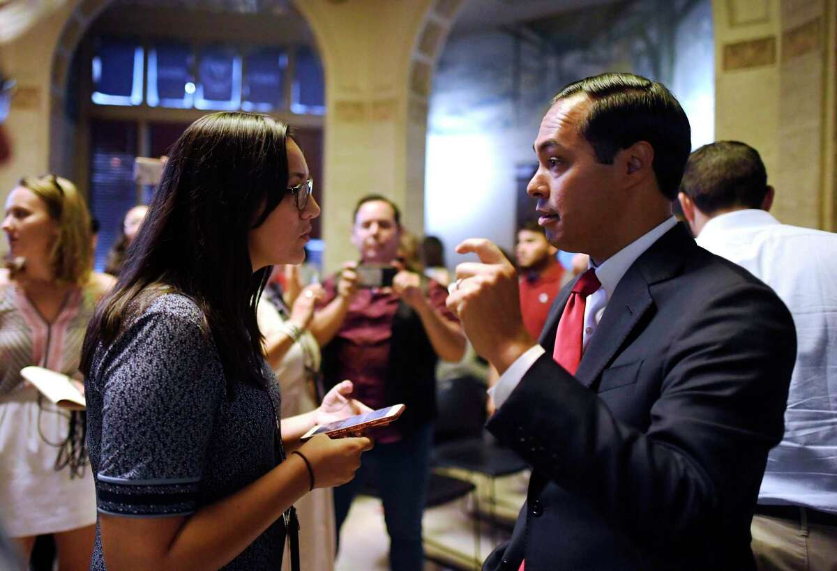 Express-News reporter Krista Torralva asks Democratic presidential hopeful Julian Castro a question in the lobby of the San Antonio Express-News on Thursday, Sept. 5, 2019.
