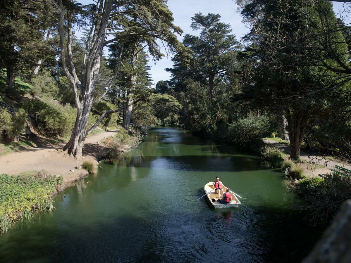 A couple rides a row boat in Stow Lake in Golden Gate Park in San Francisco, Calif. on Mar. 8, 2021.