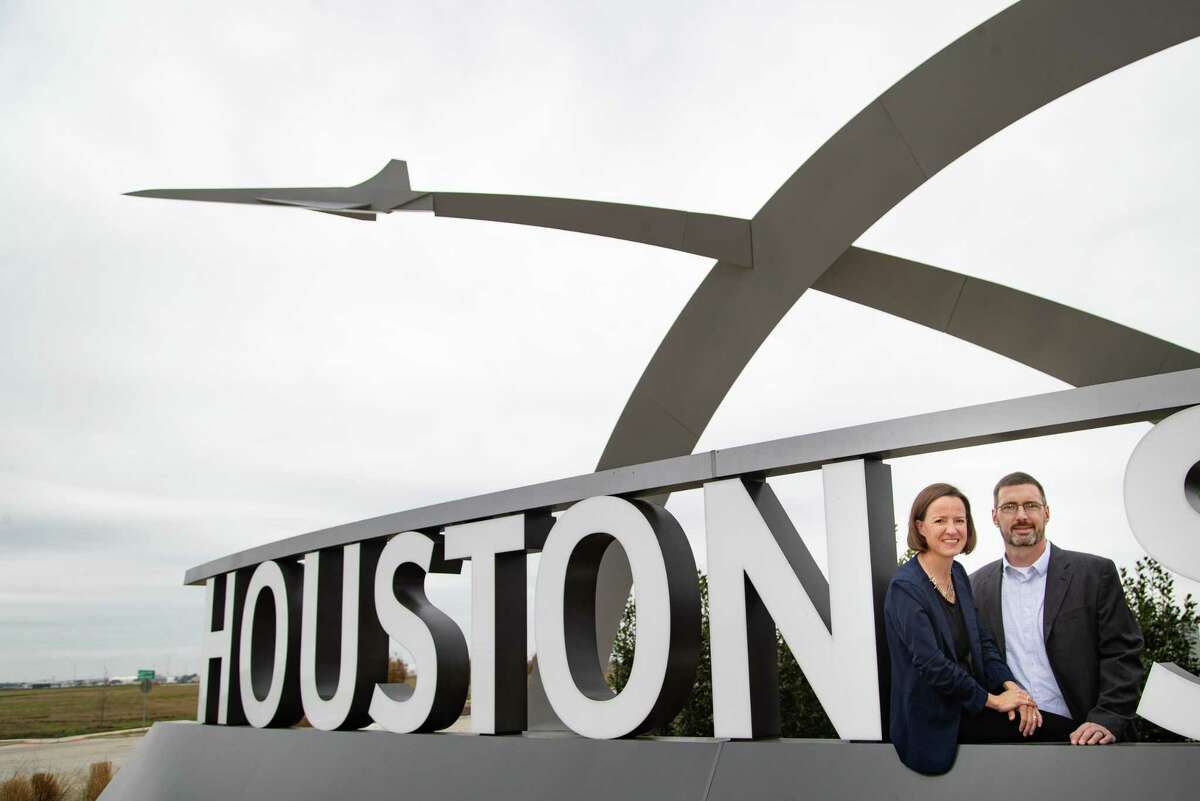 Sarah “Sassie” Duggleby, Venus Aerospace co-founder and CEO, and her husband Andrew Duggleby, Venus Aerospace co-founder and Chief Technology Officer at the Houston Spaceport entrance sign, Friday, March 5, 2021, in Houston.