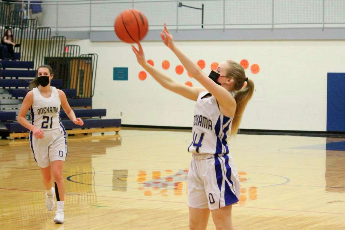 Madison Gutowski fires an outside jumper during Onekama's win over North Bay on March 9. (Robert Myers/News Advocate)