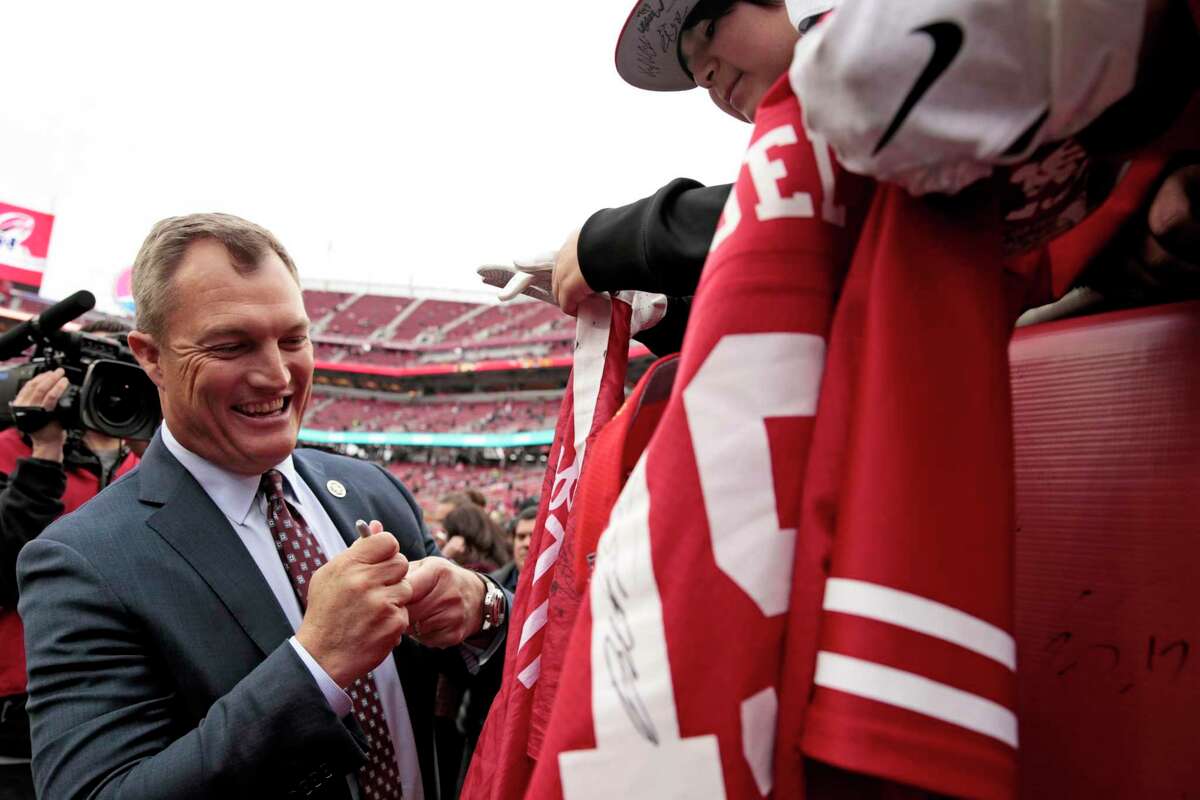 General manager John Lynch of the San Francisco 49ers walks the