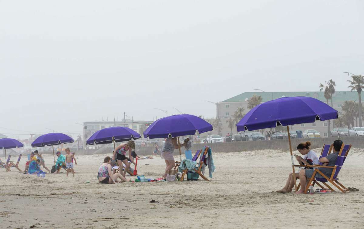 Beach chairs and umbrellas can be rented along the beach Thursday, March 11, 2021, in Galveston, Texas.