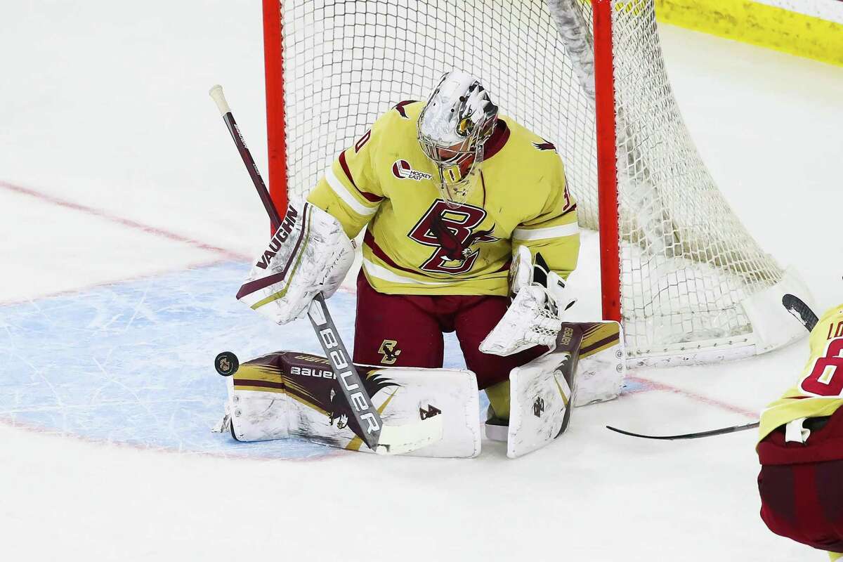 Darien's Spencer Knight makes a save during a Boston College men's ice hockey game.