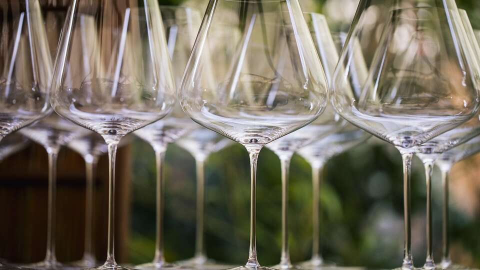 Polished wine glasses are seen in the Ken Fulk-designed 'Usu-Zan' outdoor dining room at SingleThread in Healdsburg, California on Sunday, March 7, 2021.