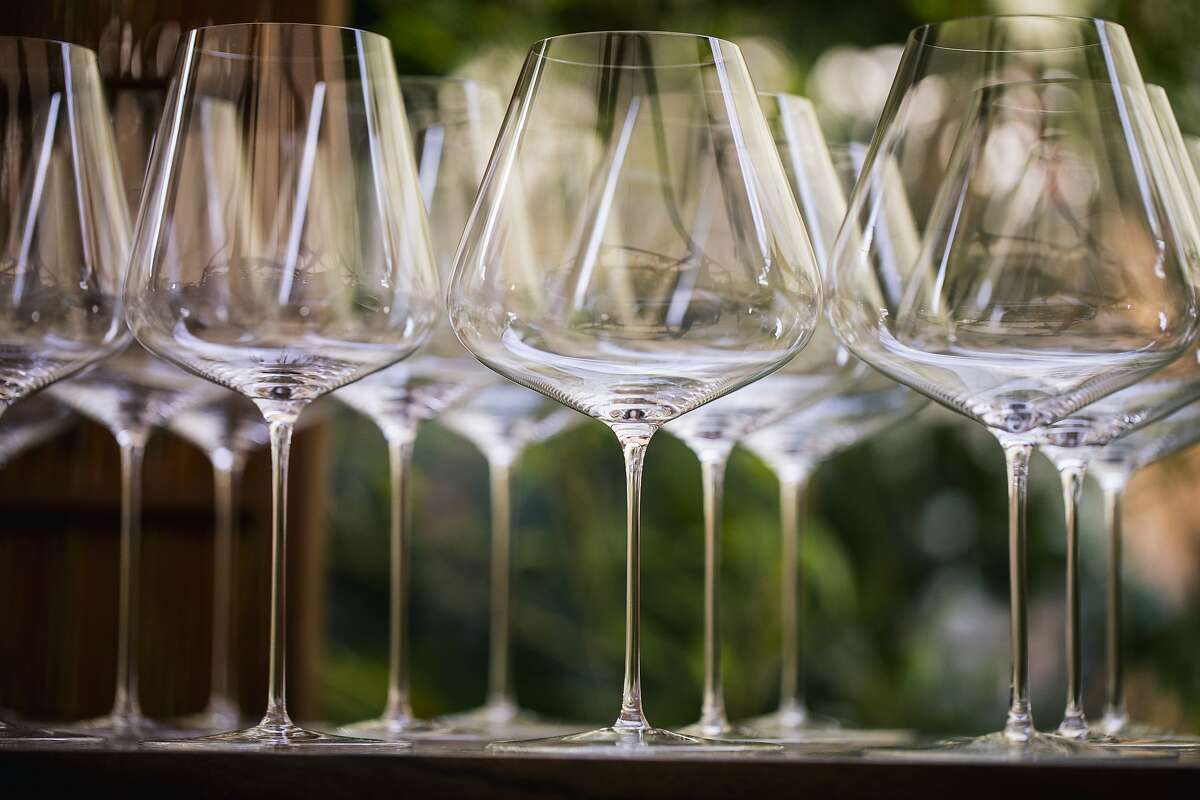 Polished wine glasses are seen in the Ken Fulk-designed 'Usu-Zan' outdoor dining room at SingleThread in Healdsburg, California on Sunday, March 7, 2021.