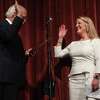 Newly elected Fairfield First Selectwoman Brenda Kupchick is sworn in by former U.S. Rep. Christopher Shays during the Oath of Office Ceremony at Warde High School in Fairfield, Conn. on Monday, November 25, 2019.