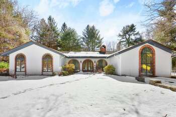 Mediterranean-inspired ranch house at 3 Sweetbriar Trail, Easton.