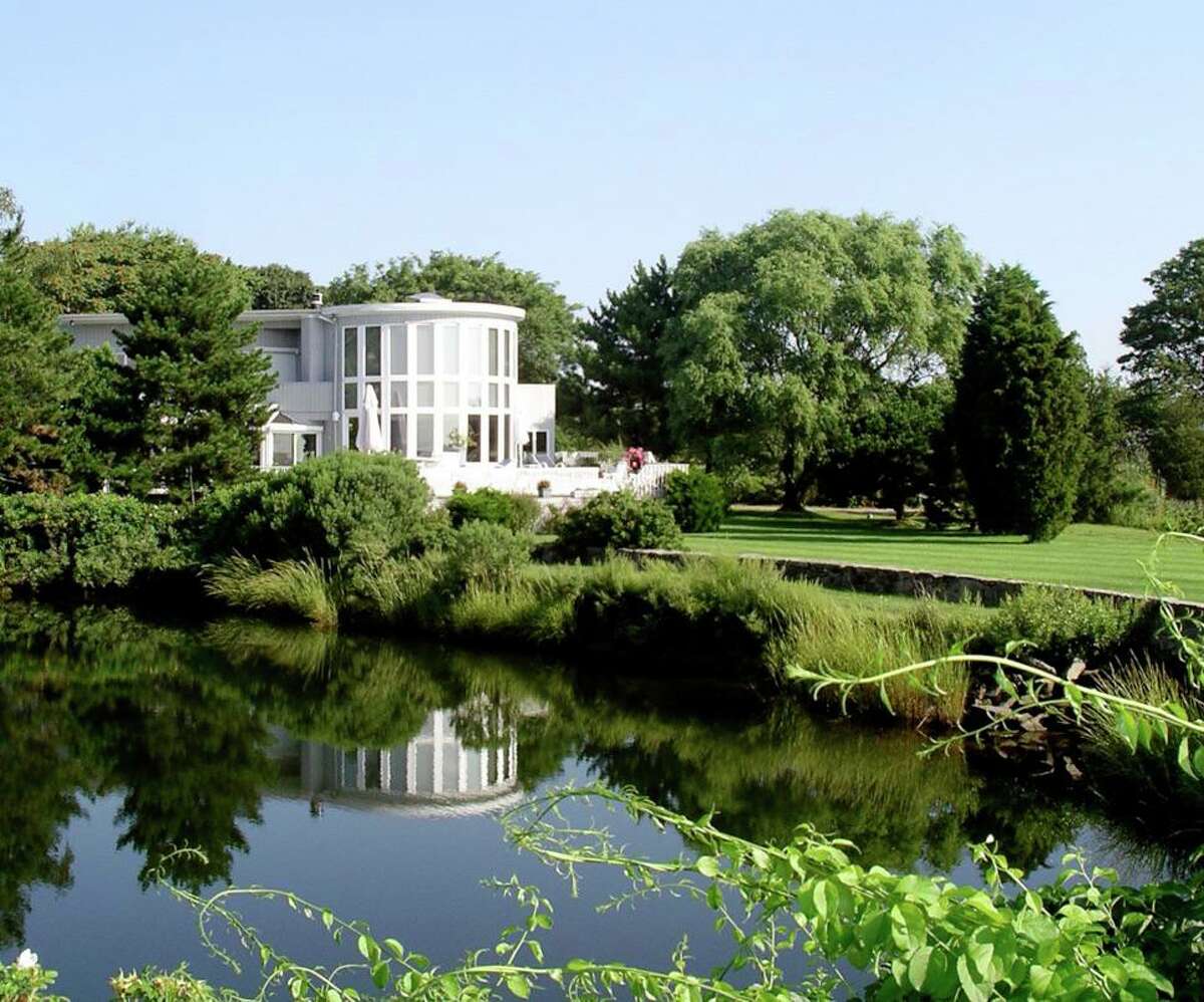 Lagoon and contemporary house at 8 Langdon Road, Westport.