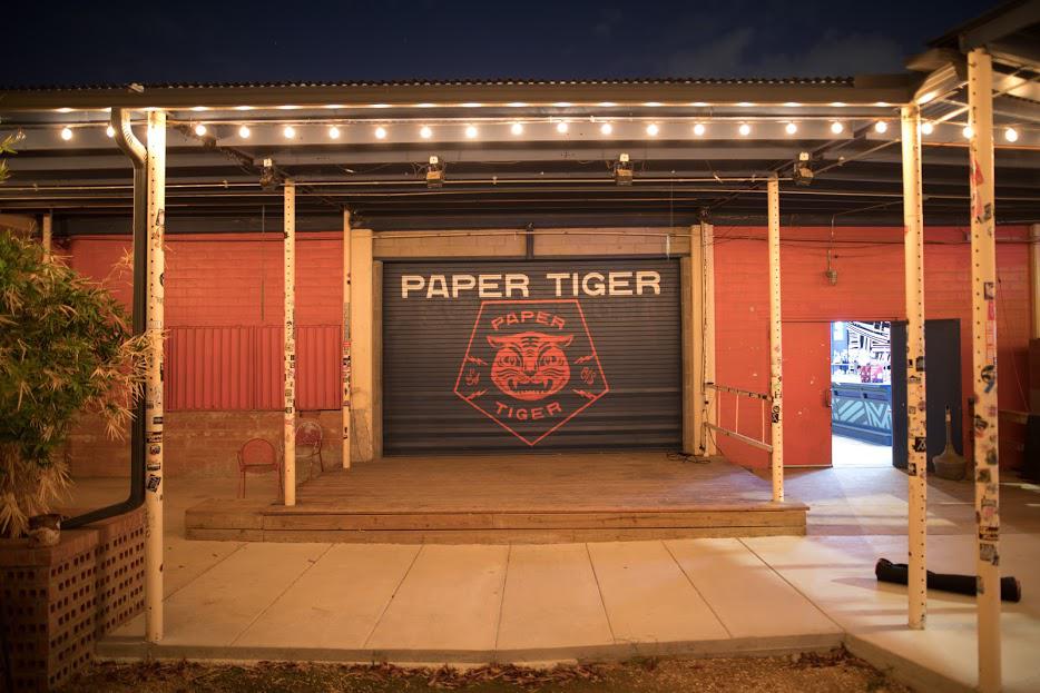 San Antonio venue Paper Tiger agrees to deal in Paxton gun suit