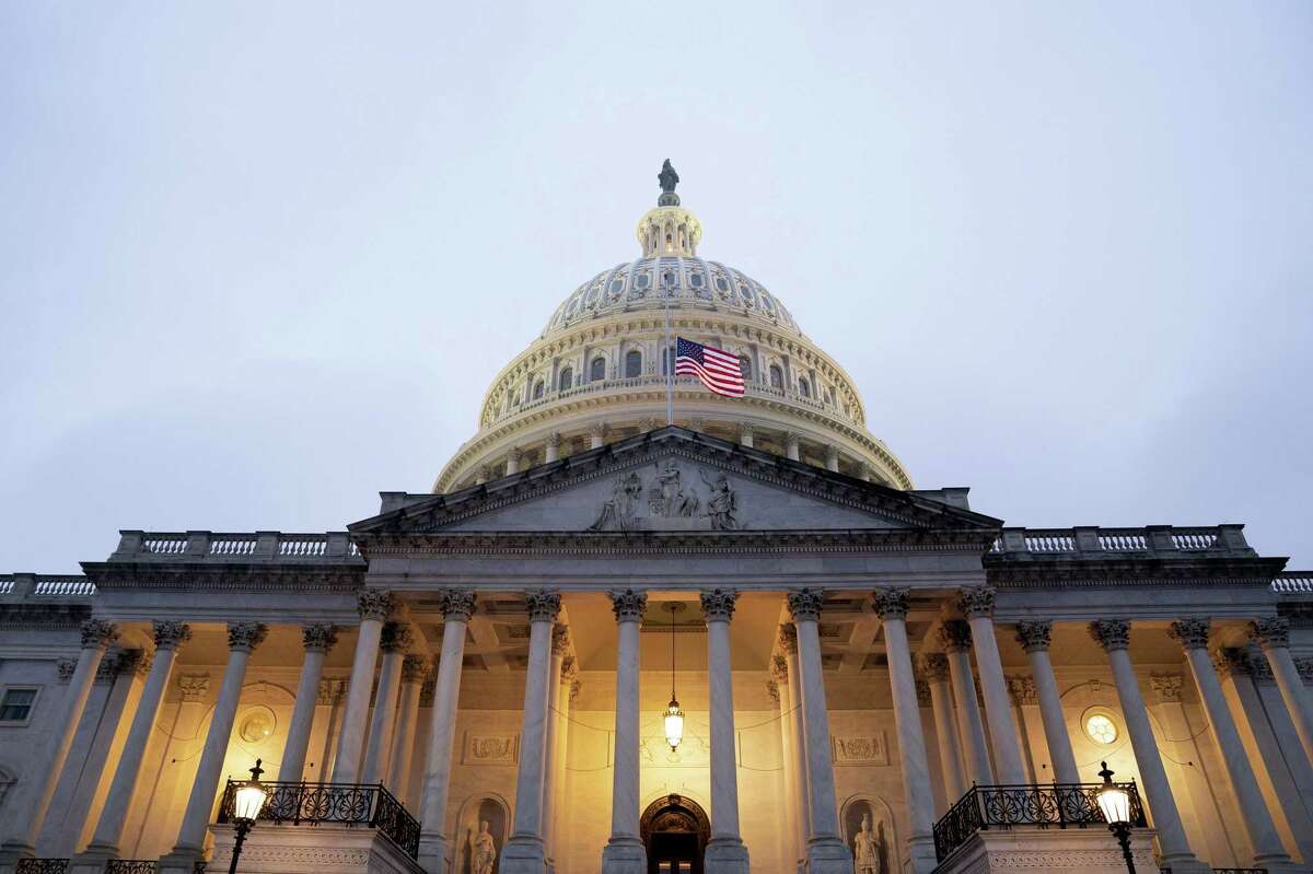 The U.S. Capitol at dusk in Washington, D.C., U.S., on Wednesday, Feb. 10, 2021.