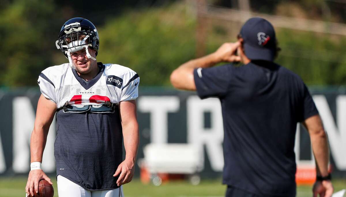Houston Texans long snapper Jon Weeks (46) talks to special teams coach Larry Izzo during training camp at the Greenbrier on Wednesday, Aug. 2, 2017, in White Sulphur Springs, W.Va. ( Brett Coomer / Houston Chronicle )