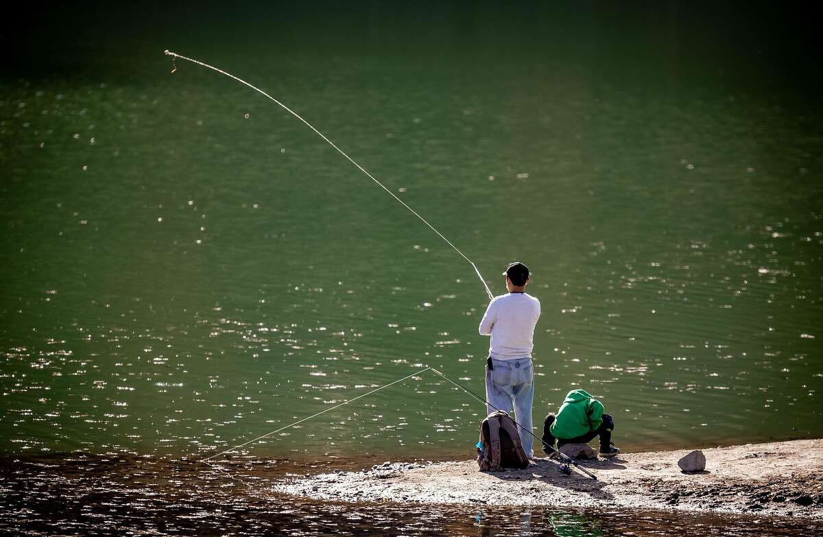 Capell Cove, on the southern arm of Lake Berryessa, provides an ideal place for this visitor to try his luck with a rod and reel.