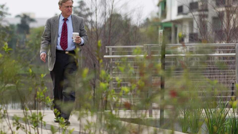 Robert Heineman, vice president of planning for The Woodlands Development Company, walks through a newly competed section of The Woodlands Waterway, an 18-year project combining commercial and residential centers with a 1.8 mile transit and pedestrian corridor through The Woodlands Town Center, Thursday, March 8, 2018, in The Woodlands.